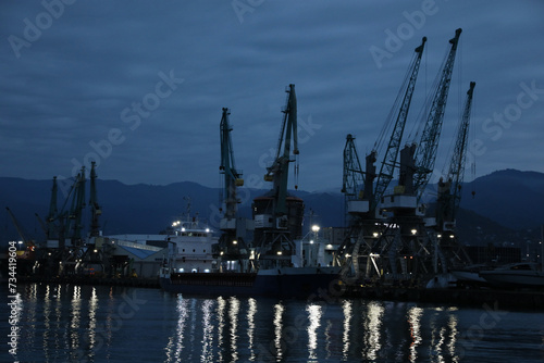 Port under dark cloudy sky in evening