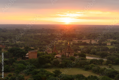 Aerial top view of burmese temples of Bagan City from a balloon, unesco world heritage with forest trees, Myanmar or Burma. Tourist destination. © tampatra