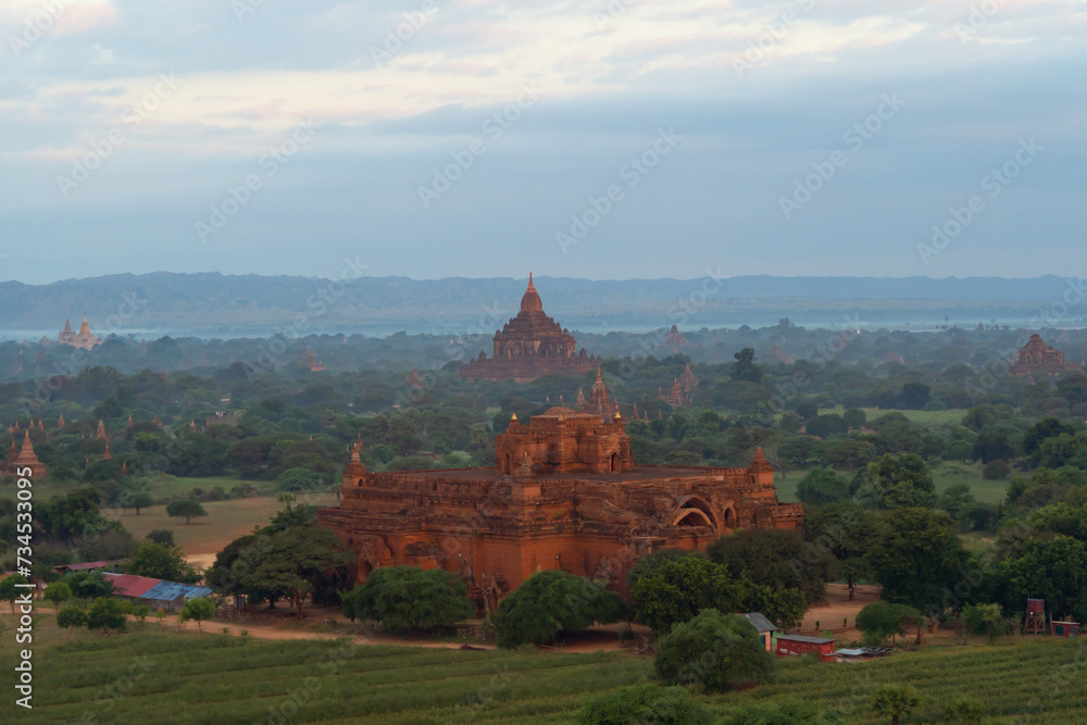 Aerial top view of burmese temples of Bagan City from a balloon, unesco world heritage with forest trees, Myanmar or Burma. Tourist destination. Aerial top view of burmese temples of Bagan City from a balloon, unesco world heritage with forest trees, Myanmar or Burma. Tourist destination.