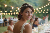A bride wearing a wedding dress at an outdoor reception
