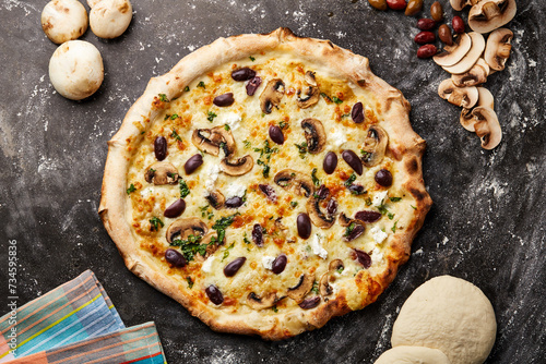 Primo Pizza topping with mushroom and coriander isolated on dark background with raw food top view of italian fastfood appetizer photo