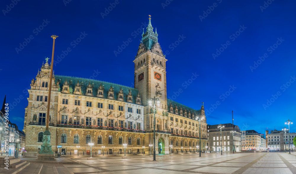 Hamburg Germany, night panorama city skyline at Rathaus City Hall Square