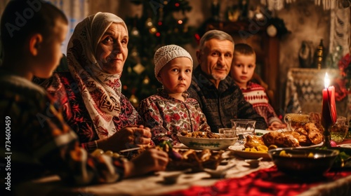 Family Gathering for a Festive Christmas Dinner in a Cozy Candlelit Setting © stock photo