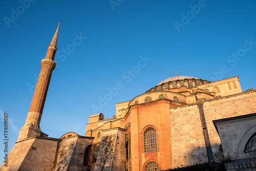 Detail of Hagia Sophia, the iconic historical site in Istanbul, Turkey. Originally a 6th-century church, it transformed into a mosque, then a museum, and was officially reconverted in 2020. photo