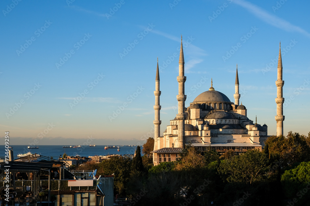 Fototapeta premium View of the Blue Mosque, also called Sultan Ahmed Mosque, an Ottoman-era imperial mosque in Istanbul, Turkey, built between 1609 and 1617 under Ahmed I's rule, still functioning today.