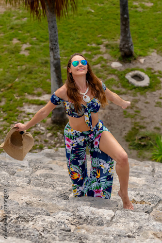 Ethereal Journey: A Young Beauty's Sojourn through Xcambo Mayan Ruins in Telchec, Yucatan, Amidst a Caribbean Oasis photo