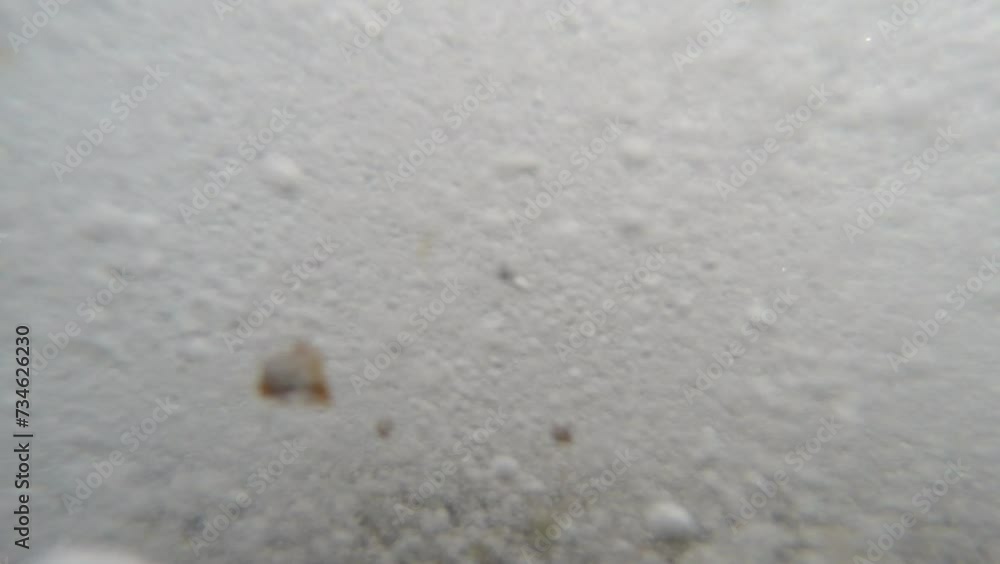 Underwater view of air bubbles in the sea water. Waves underwater view Underwater view of air bubbles in the sea water. Waves underwater view