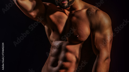 Muscular body. Muscular man. Male body, muscle shape, strong man. Athletic man posing shirtless. Gay with naked torso. Muscular model. Sport men body concept. Muscular power. Strong and sexy. photo