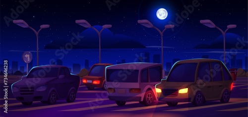 Cars parked in public city parking lot at night. Cartoon vector dark dusk landscape with vehicles stand on asphalt road with signs and zone layout under moon light with town skyscrapers on background.