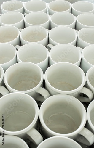 Row of coffee cups ready to use