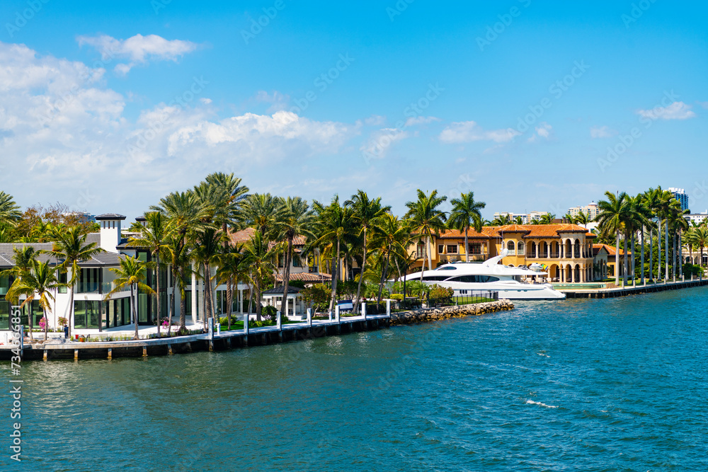Luxury summer villa with yacht pier. Vacation in summer paradise. Luxury resort at summertime. Travel to tropical bay of Florida. Summer vacation in tropical paradise resort. Fort Lauderdale