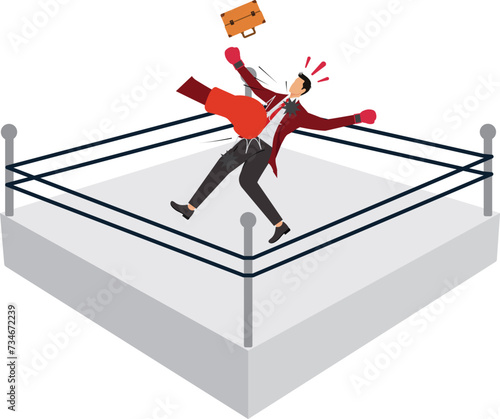 Defeated businessman boxer being hit by a huge boxing glove