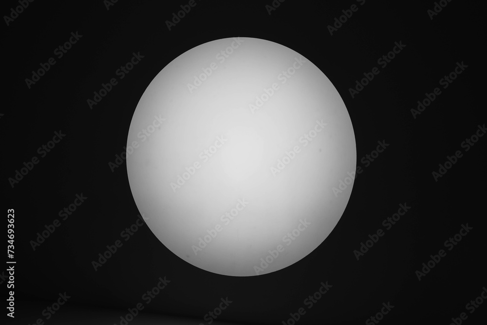 a light circle on a dark background a light circle on a dark background