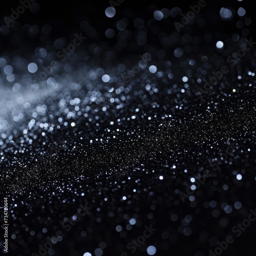 Black background with glitter.