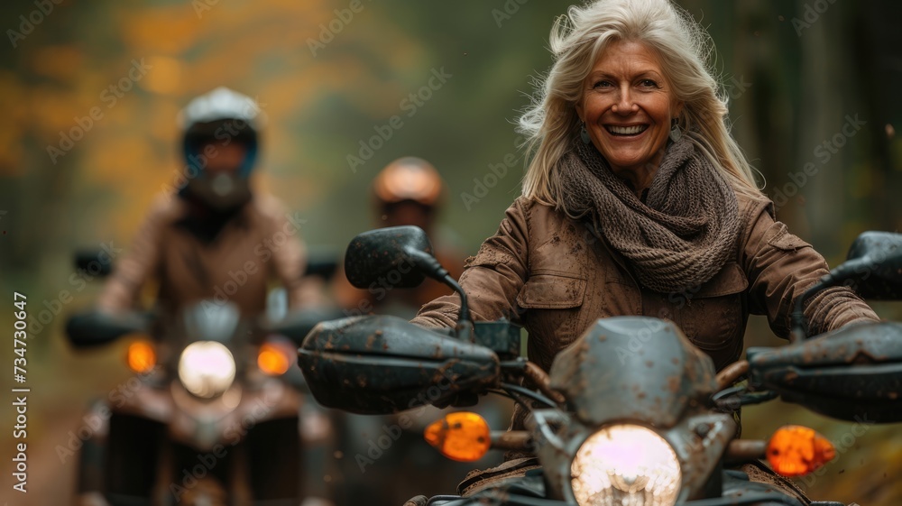 Senior women friends ready to drive quadbikes Senior women friends ready to drive quadbikes