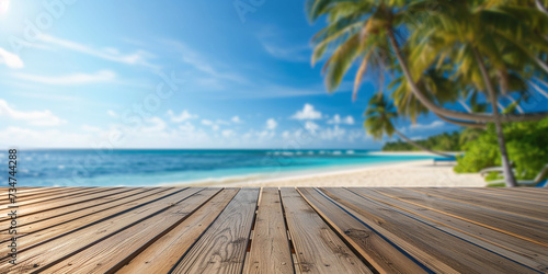 Empty wooden planks with blurred tropical beach background. 