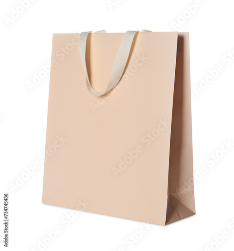 One beige shopping bag isolated on white