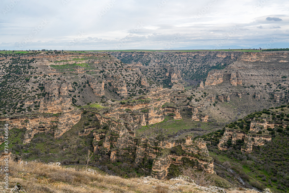 Ulubey Canyon is a nature park in the Ulubey and Karahallı of Uşak, Turkey. The park provides suitable habitat for many species of animals and plants and is being developed as a centre for ecotourism.