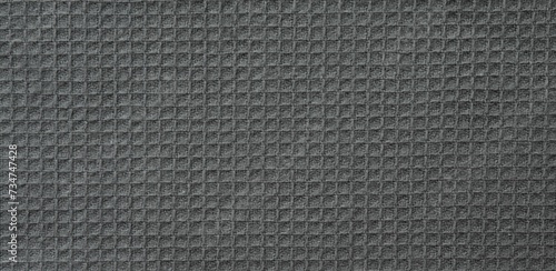 Texture of grey knitted fabric as background, top view