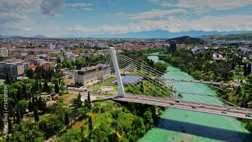 Aerial view of the cityscape of Podgorica behind the Millennium Bridge, a cable-stayed bridge over the Moracha. Montenegro