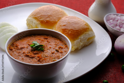 Pav bhaji is a fast food dish from India consisting of a thick vegetable curry served with bread.