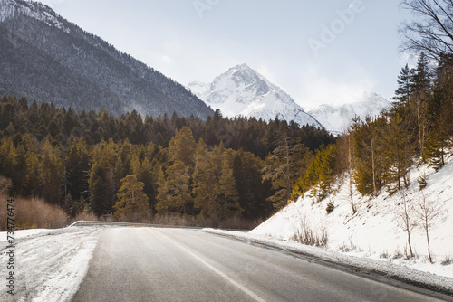 Country road in winter mountains