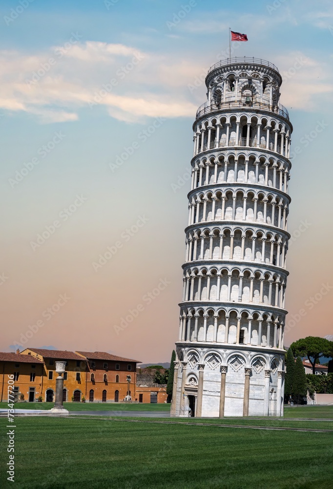 Famous tower in Pisa in Italy, Tuscany at summer during sunset.