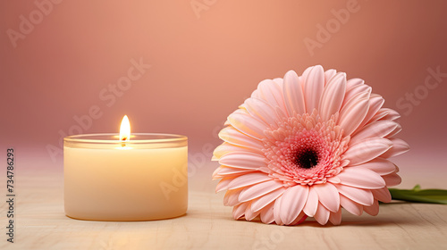Lighted aromatic candles are placed on a wooden cream colored circular platform and pink Gerbera Daisy Herbras flowers all around on a light pink background created with Generative AI Technology