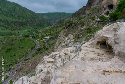 Day view of caves, stairs and mountains. Vardzia is a cave monastery, an ancient rock-hewn town, was excavated in the Erusheti Mountain.