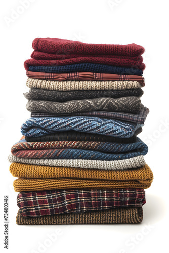 Stack of cotton colorful clothes isolated on white background