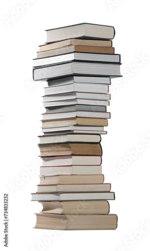 High stack of many different books isolated on white