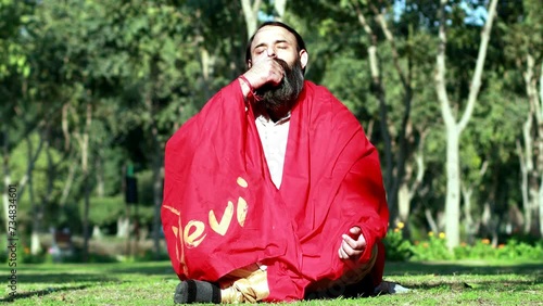 Anulom vilom yoga posture in the park. photo