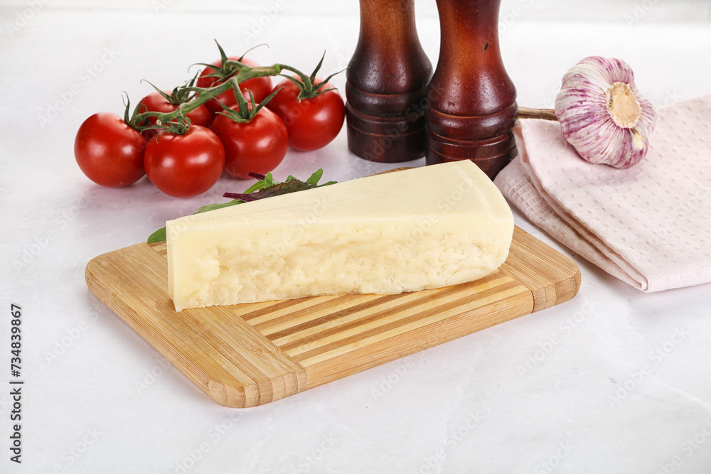 Piece Italian hard parmesan cheese Piece Italian hard parmesan cheese