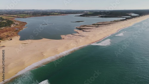 Aerial View of Santo Andre Beach By Lagoa de Santo Andre In Santiago do Cacem, Portugal. photo