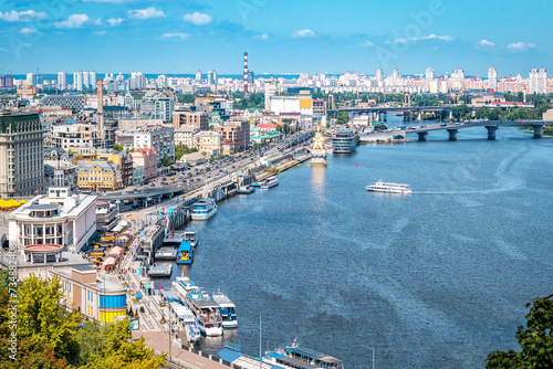 View on Podil district and Dnipro river in Kyiv city from the Pedestrian Bridge photo