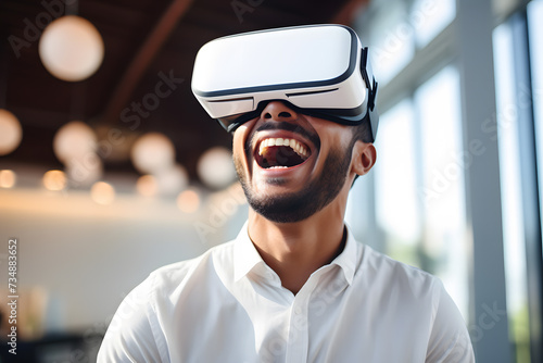 Laughing man with white VR glasses. © Firn