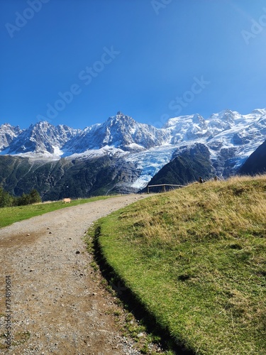 Curved road to the snowy mountains in Chamonix