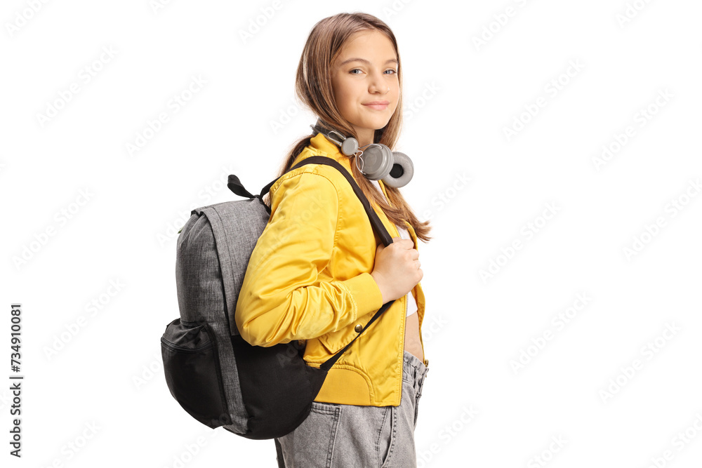 Female teen student with headphones and backpack Female teen student with headphones and backpack