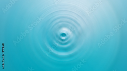 Water surface ripples  water drops  circles  spirals  waves  vortex  blue sea background image