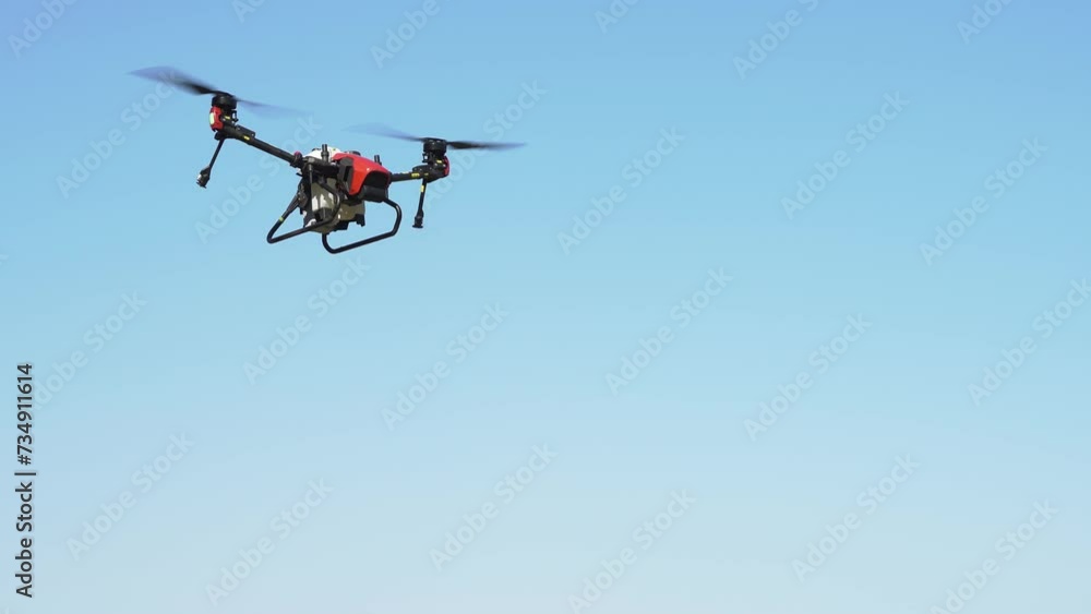 Agrodron treats fields with insect repellant from the air. Sprayers Agrodrone live. Quadcopter flight over the field, help in fertilizer, pesticides. Agrodron treats fields with insect repellant from the air. Sprayers Agrodrone live. Quadcopter flight over the field, help in fertilizer, pesticides.