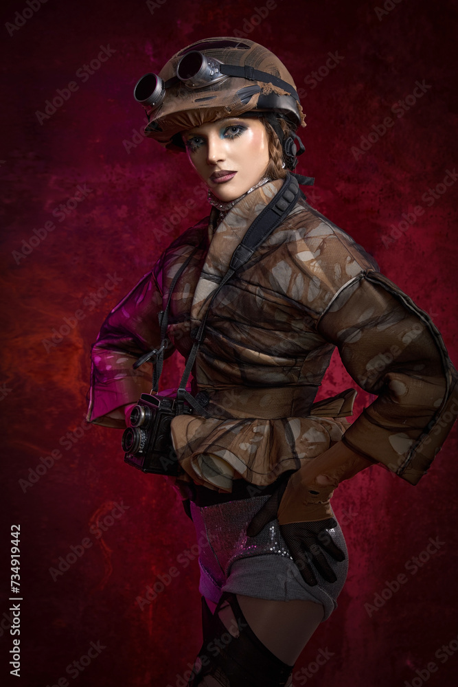 A girl with stylish makeup is dressed in post-apocalypse and cyberpunk style against the background of iron rusty wall A girl with stylish makeup is dressed in post-apocalypse and cyberpunk style against the background of iron rusty wall