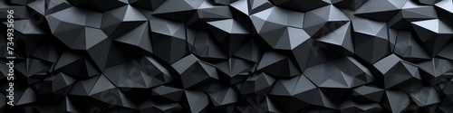 A 3D black wall with a matte finish, featuring an array of interlocking polygons. photo
