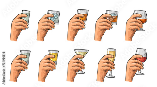 Hand holding glass tequila, vodka, rum, cognac, whiskey, gin, cocktail.