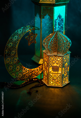 Ramadan Kareem background, Vintage lantern lamp with crescent moon shape on dark background
