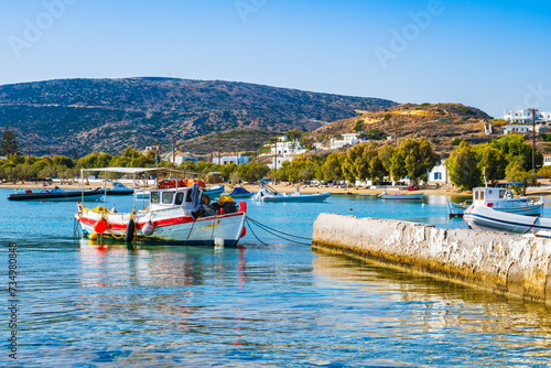 Fishing boat in Pollonia port, Milos island, Cyclades, Greece photo