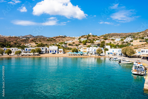 View of Kimolos port with white houses and sea bay, Kimolos island, Cyclades, Greece © pkazmierczak