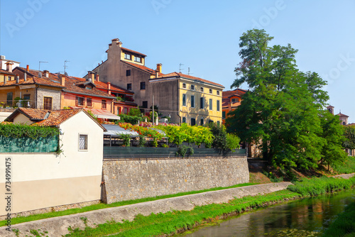 Old houses on the banks of water canal in Padua, Italy  photo