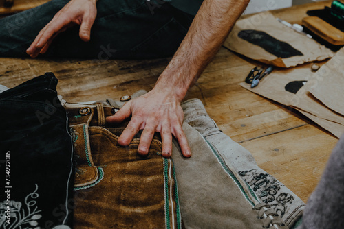 Schilderij op canvas Making and sewing traditional Bavarian shorts