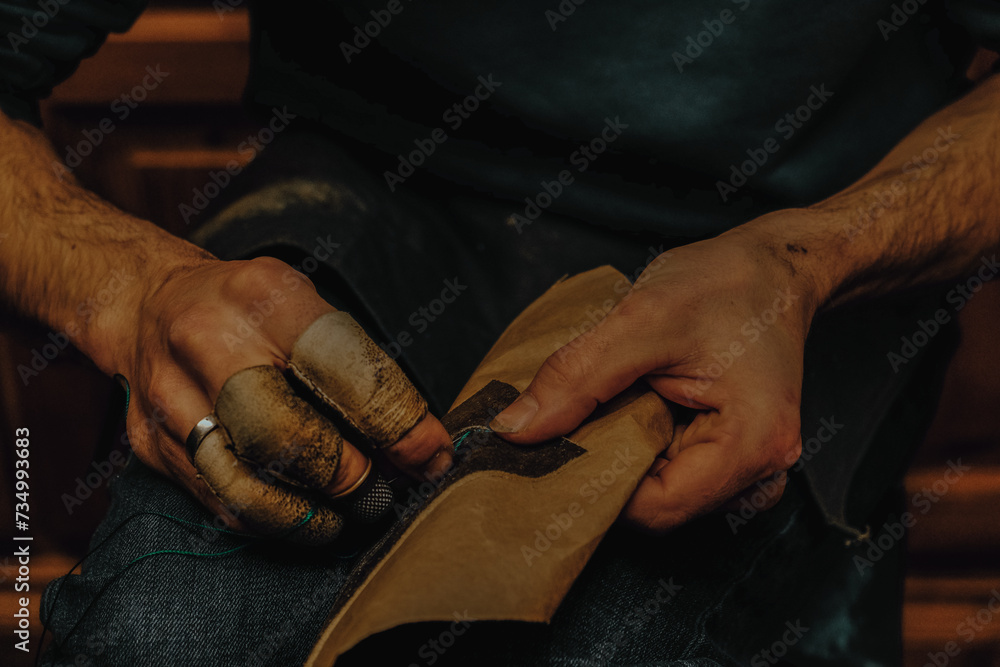 Tailor's hands close up. Rustic style