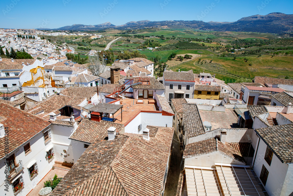 Ronda ind Andalusia, Spain. View from above on the touristic city, houses and roofs.